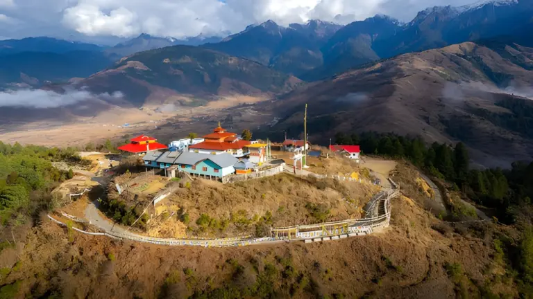 Aerial view of a monastery on a hilltop in Mechuka, Arunachal Pradesh