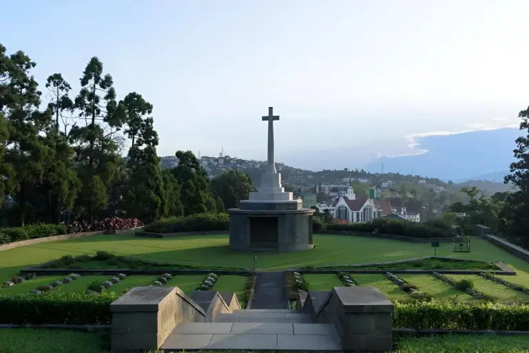 Cross monument and graves at Kohima War Cemetery, Nagaland