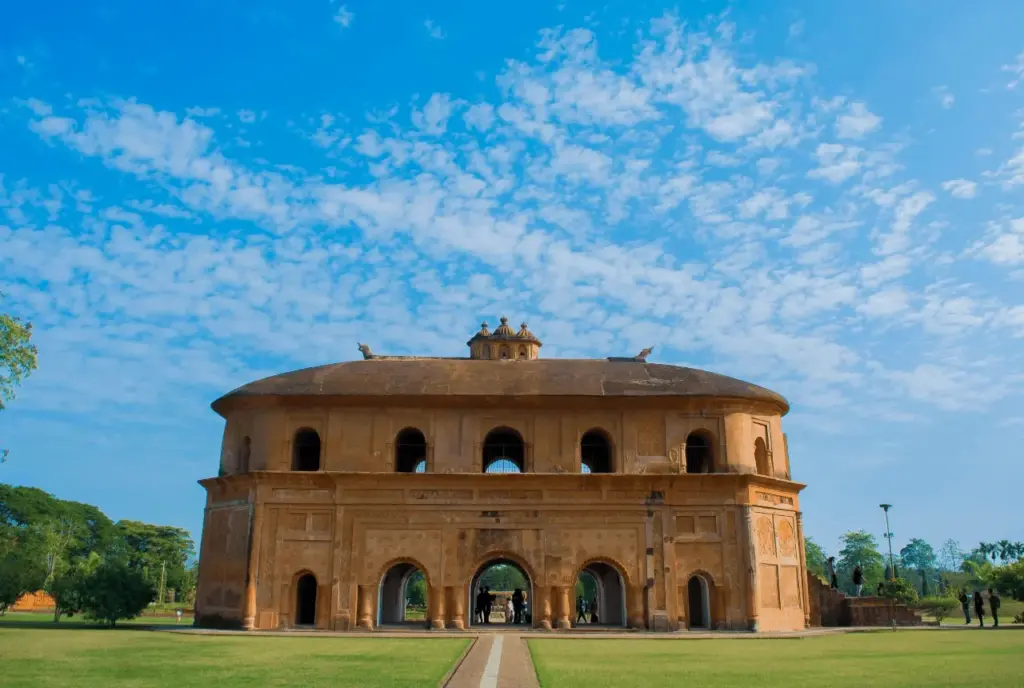 Front view of Rang Ghar under a clear blue sky Sivasagar