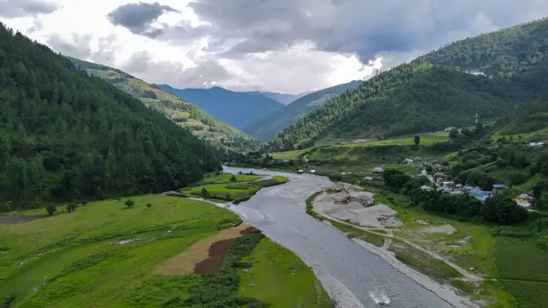River flowing through Sangti Valley surrounded by green hills in Arunachal Pradesh