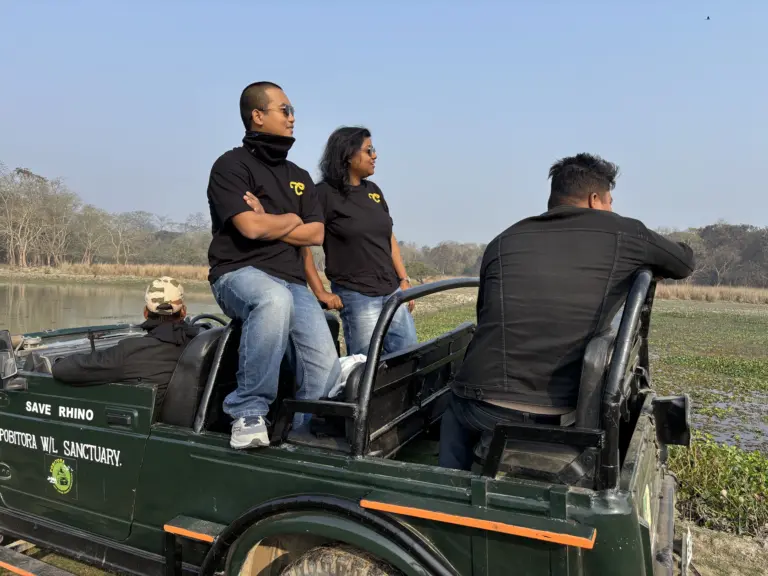 Tourists enjoying a jeep safari in Pobitora Wildlife Sanctuary