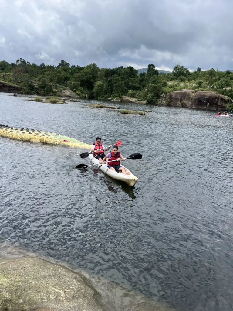 Two people kayaking on the lake at Mawlyngbna Meghalaya