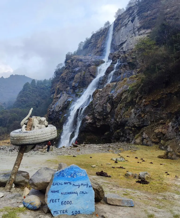 Waterfall cascading down rocky cliffs at Nuranang Falls, Arunachal Pradesh