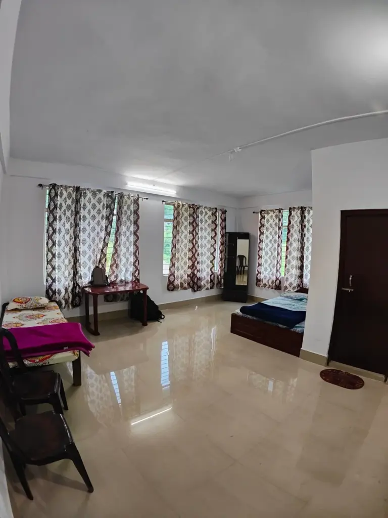 Spacious homestay room with double bed near the Hornbill Festival