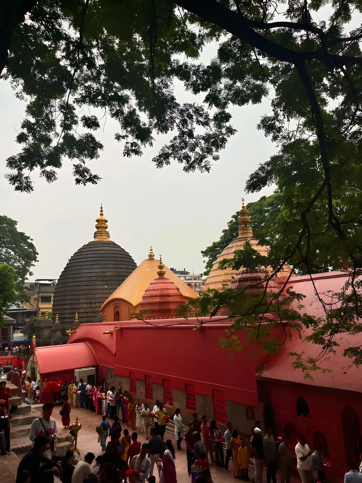 Kamakhya Temple in Assam with devotees gathered around the temple