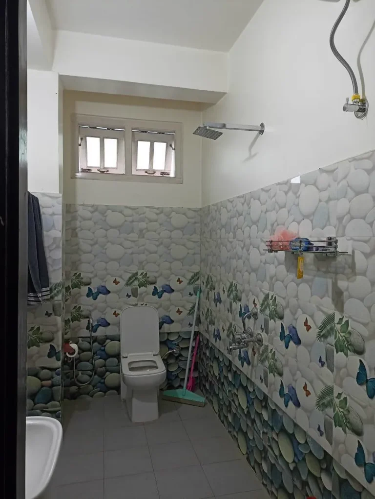 Attached bathroom at Nirvana Homestay