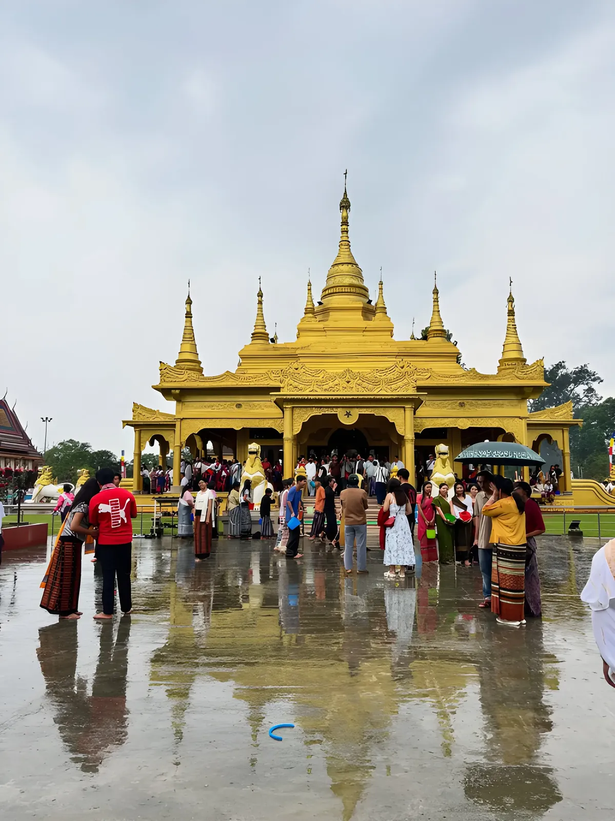 Visitors gather at the golden pagoda during the Sangken Festival in Namsai, Arunachal Pradesh