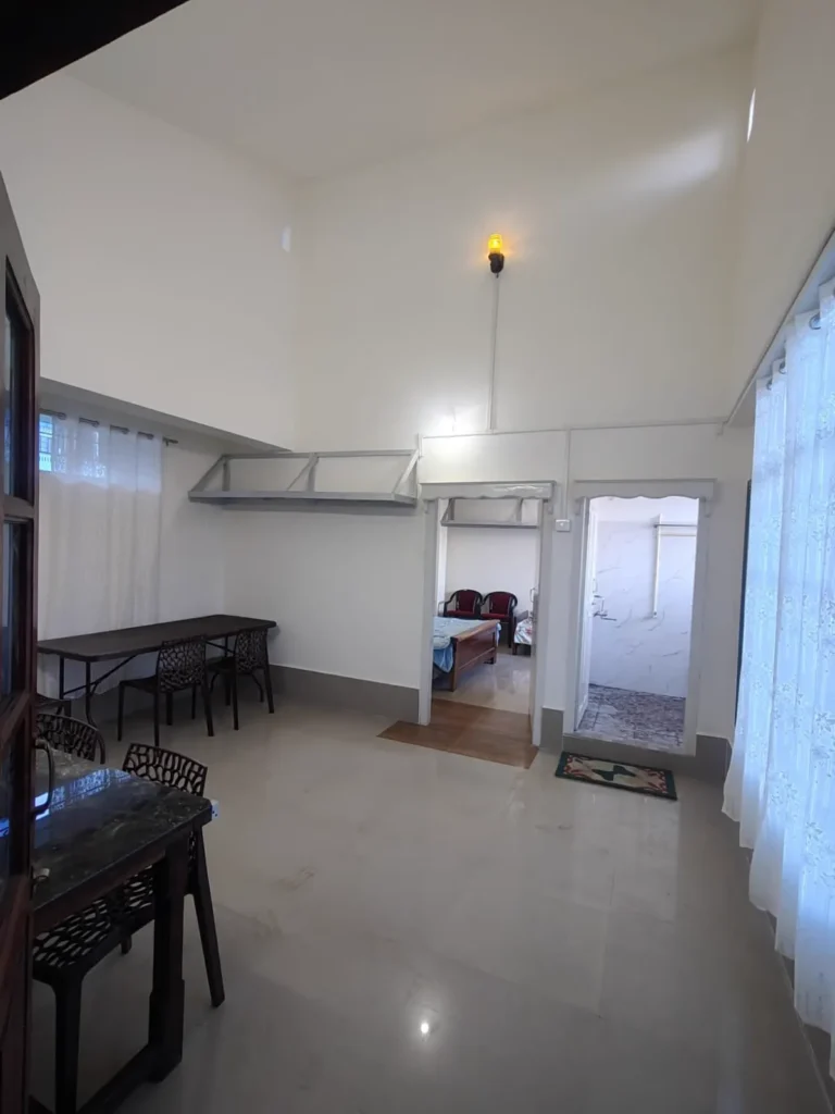 Room with dining table at Solace Homestay